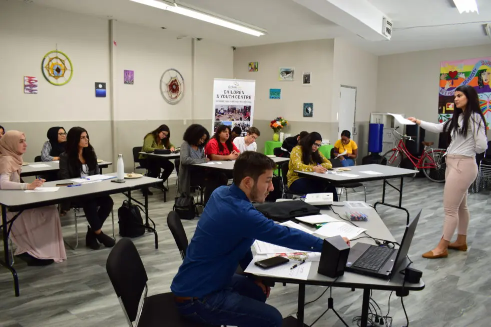 Group of people sitting in a class