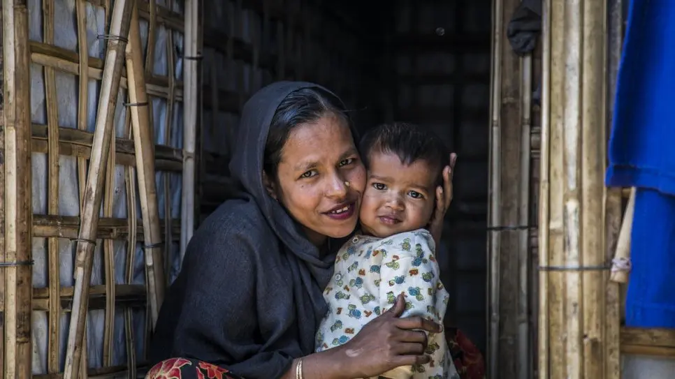 New shelter eases monsoon threat for young Rohingya family