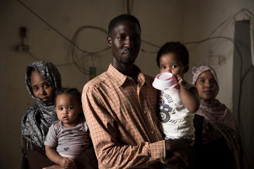 A Sudanese family poses for a picture in Libya