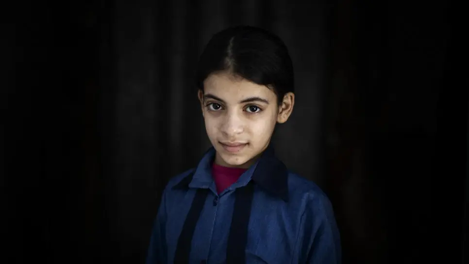 Nine years of conflict weigh heavily on Syrian refugee girl