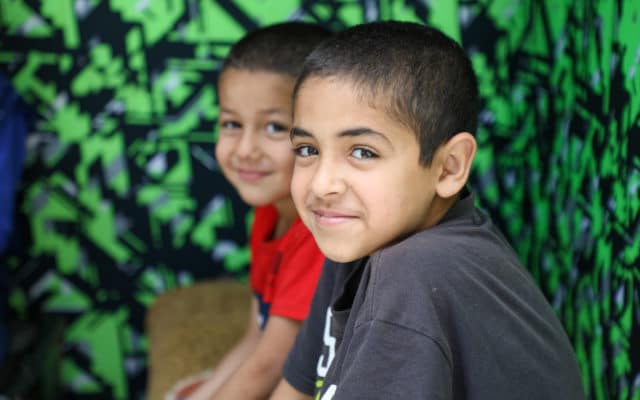 Two boys smiling