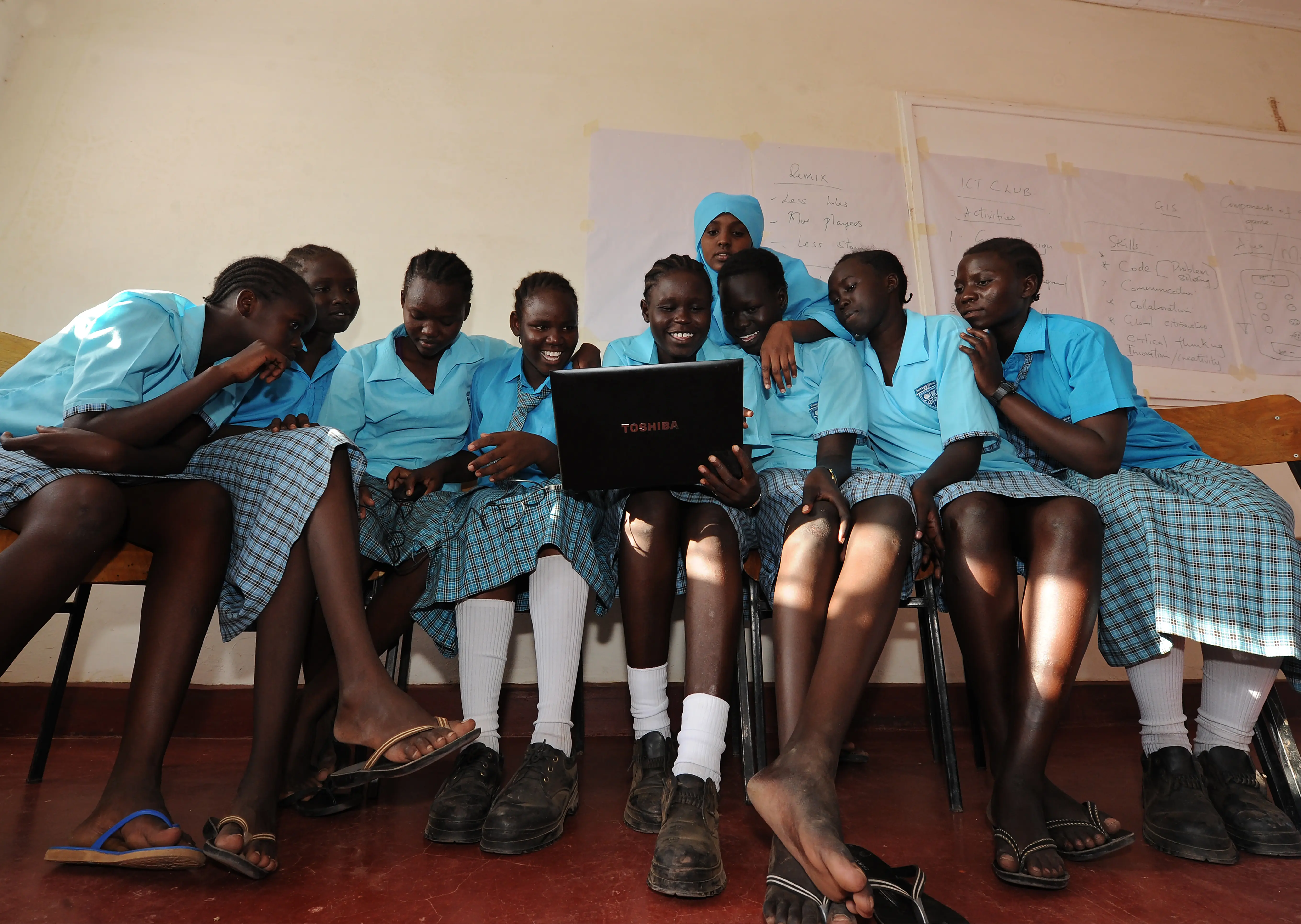 Eighteen-year-old South Sudan refugee Esther Nyakong (C) and fellow students at the Morneau Shepell boarding school for girls study computer literacy in 2016. Esther reached the nearby Kakuma refugee complex in northwest Kenya after fleeing her home with her mother and two sisters in 2008 and hopes to eventually attend university though less than 1% of refugee students reach higher education. ; The Kakuma refugee camp in northwest Kenya was established in 1992 to house thousands of refugees fleeing civil war in neighboring Sudan. By 2016 the population had swelled to nearly 190,000 and included civilians from South Sudan, Sudan, Burundi, Ethiopia, the Democratic Republic of Congo, Eritrea, Uganda and Rwanda. 