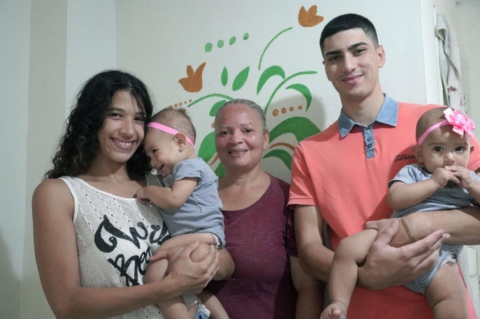 A family poses for a portrait