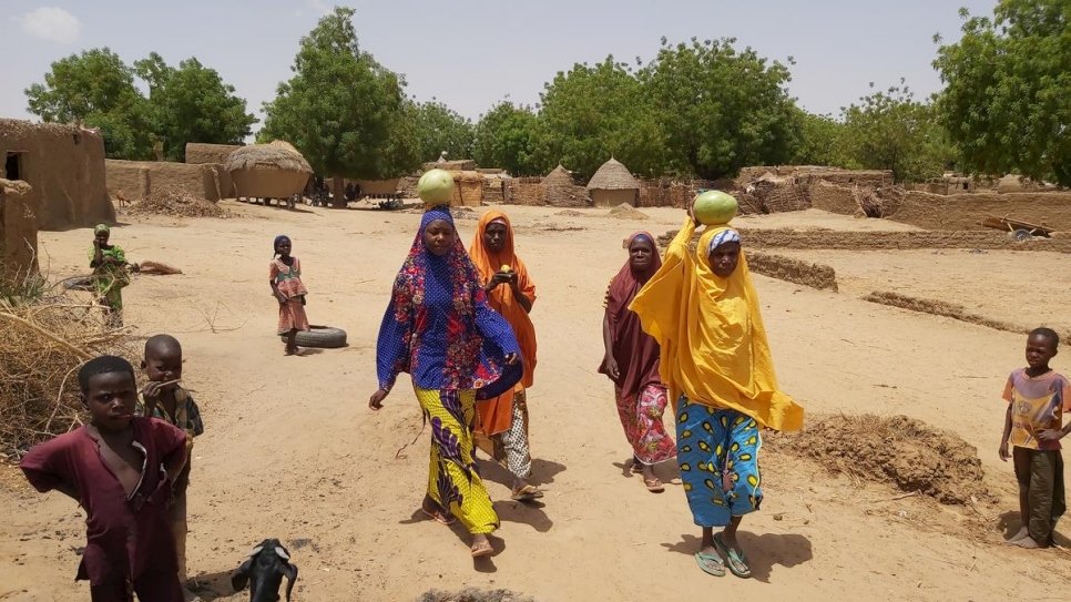 Nigerian refugee women and relatives in Niger in the village of Garin Yahaya where they have found safety