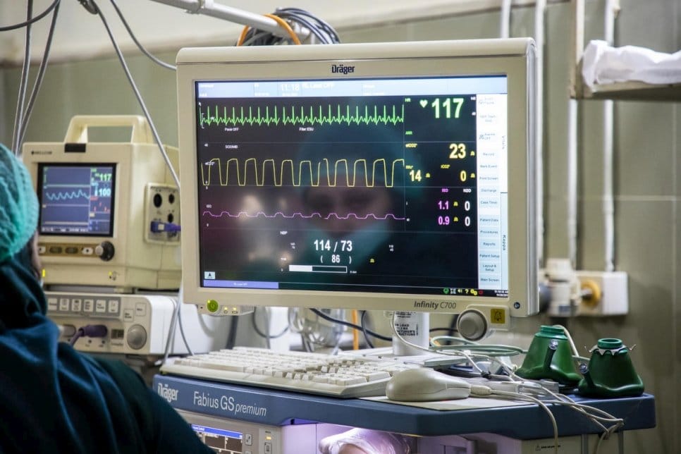 A machine monitors a patients vital signs