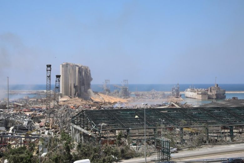 The ruins of the giant grain silos stand amid the port of Beirut, devastated in the 4 August explosion
