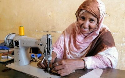 Malian refugees in Niger make face covers to prevent the coronavirus spread