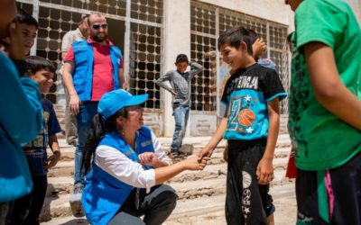 UNHCR chief praises aid workers battling multiple crises