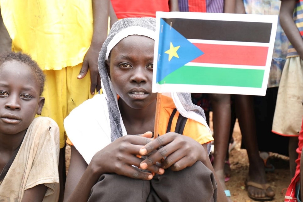 Sudanese girls stand outside Nur primary school in Doro refugee camp, South Sudan, May 2018