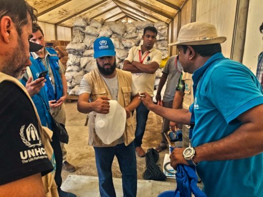 A senior delegation from the Thani Bin Abdullah Bin Thani Al-Thani Humanitarian Fund is briefed on relief items distributed to Rohingya refugees in Cox’s Bazar, Bangladesh