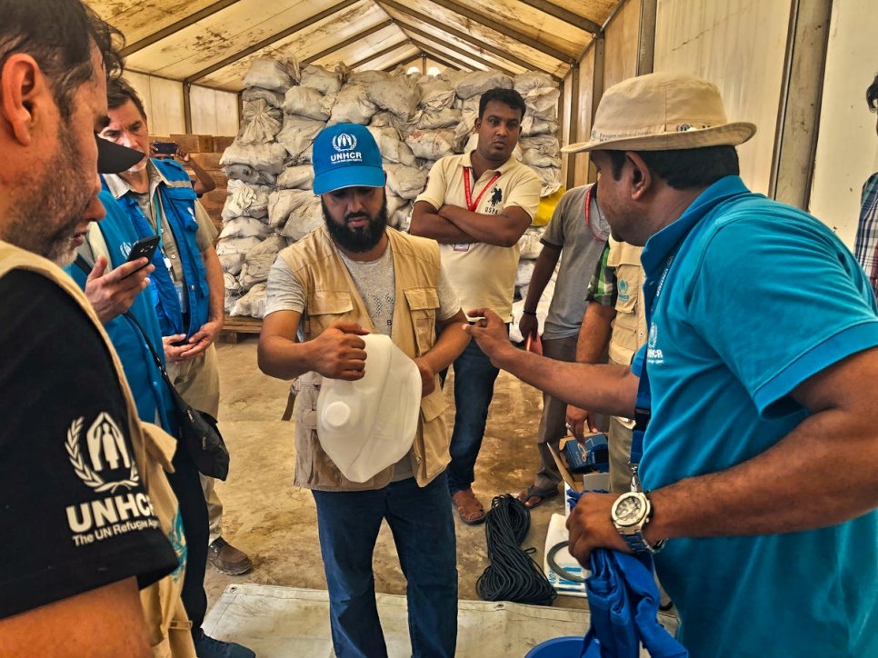 A senior delegation from the Sheikh Thani Bin Abdullah Bin Thani Al-Thani Humanitarian Fund is briefed on relief items distributed to Rohingya refugees in Cox’s Bazar, Bangladesh
