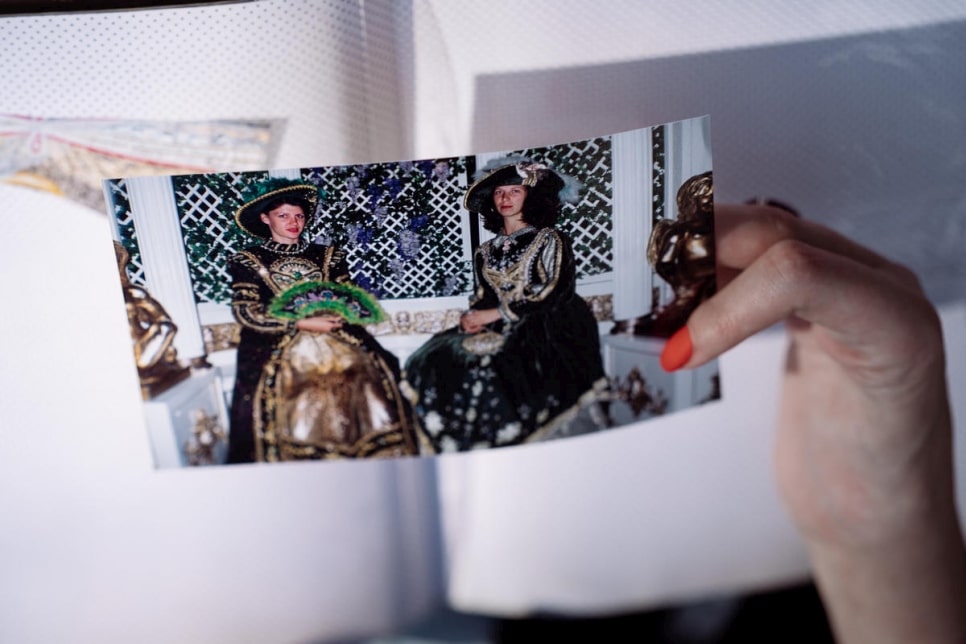 Anna Miryasheva holds a photo of her late mother, Olena – shown on the left, with a friend. Olena fought for a residence permit in Ukraine for more than 21 years before she died of cancer in 2019