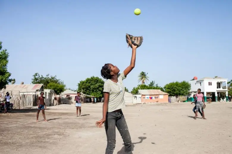 Girls of Haitian descent play baseball in Tamayo, Dominican Republic