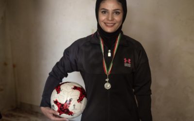 Afghan sports coach helps young refugees find a path to school in Iran