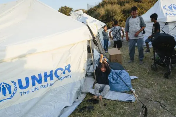 Afghan refugees at a temporary site set up by Greek authorities and UNHCR to shelter some of the thousands who fled the Moria reception centre fire, Lesvos, Greece