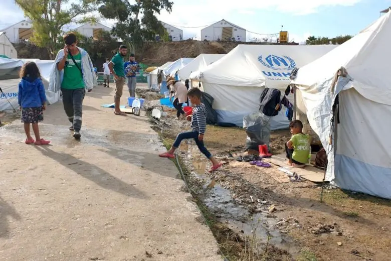 Refugees and migrants at the Kara Tepe emergency site on the Island of Lesvos, Greece. 