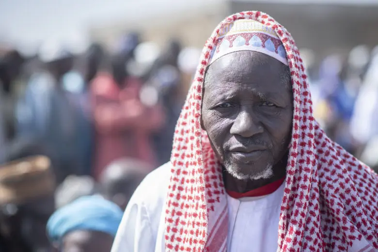 Barra Souleyman waits with other internally displaced Burkinabe for the visit of UN High Commissioner for Refugees Filippo Grandi in Gori, Burkina Faso