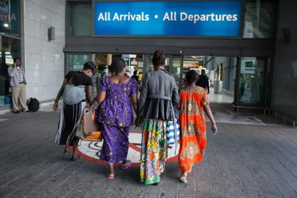 A Congolese family in an airport.