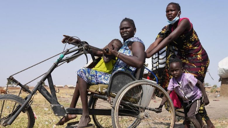 Family on a wheelchair.