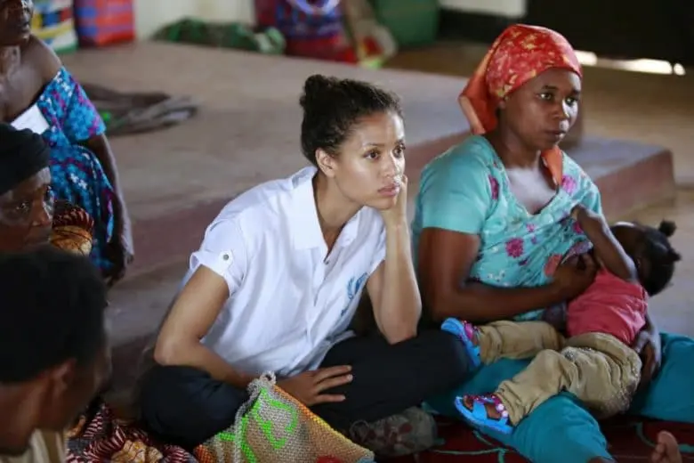 Gugu Mbatha-Raw at the Women’s Centre in Nakivale Refugee Settlement, Uganda, May 2019, with Sifa Semeki, a refugee.