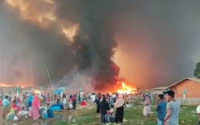 Bangladeshi authorities, aid agencies and refugee volunteers rush to respond as massive fire leaves some 45,000 Rohingya refugees without shelter
