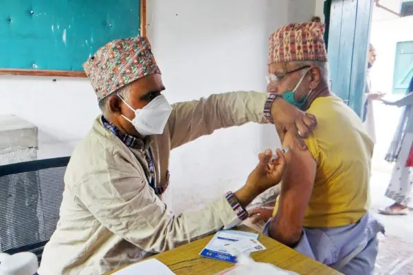 Man receives vaccine.