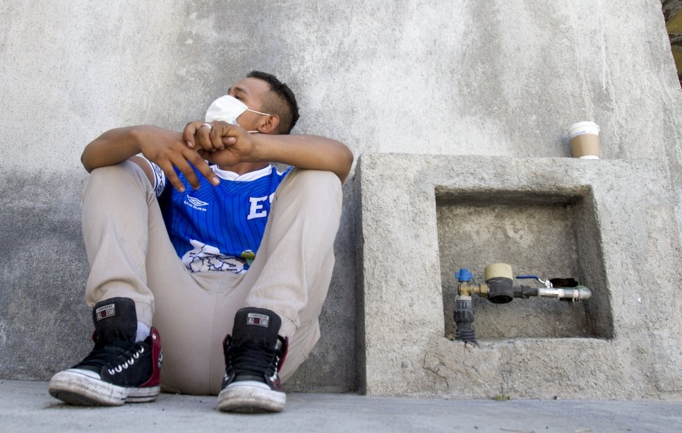 A Salvadoran refugee outside his workplace.