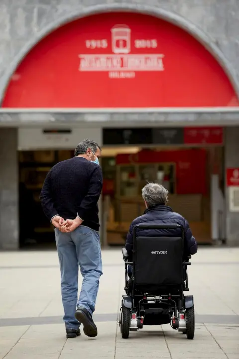 Majed walks with Joseba.