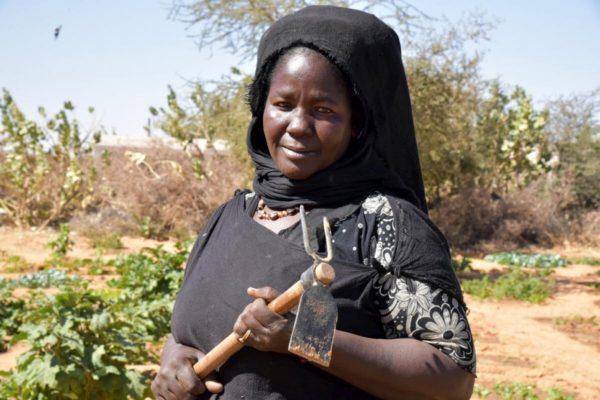 Zeina, a Malian refugee, grows vegetables in Mbera refugee camp. Her family farmed in Mali but she learned new techniques in Mauritania
