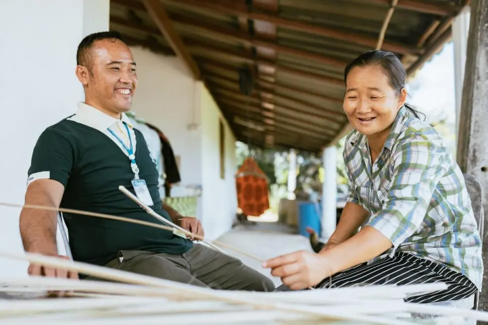 Yutthachai with one of his stateless clients.