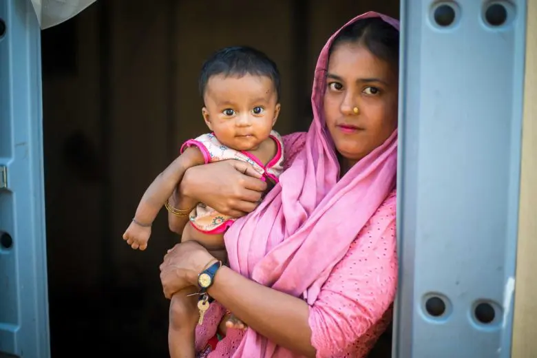 A Rohingya woman and her child