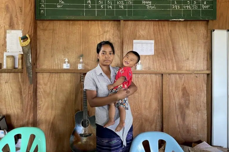 woman holding child 