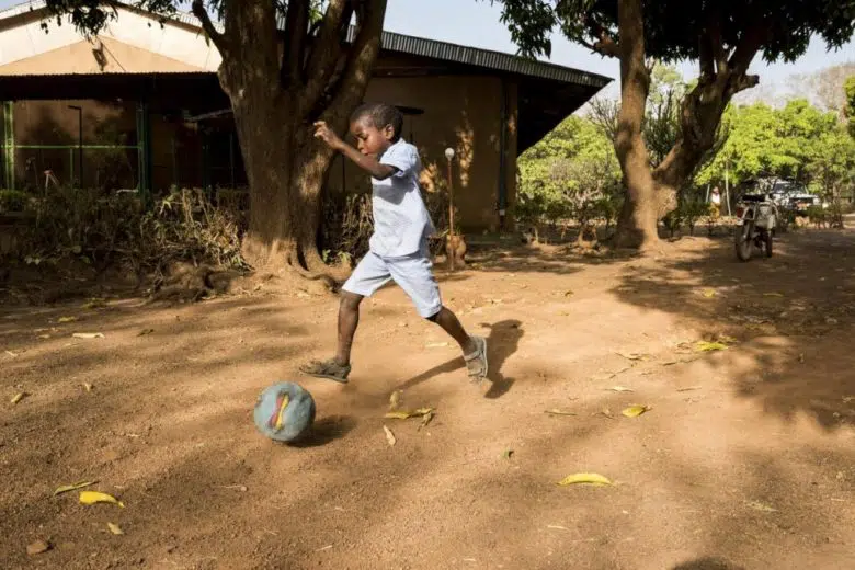 child playing with ball 