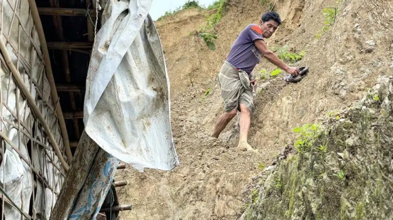 man climbing down 