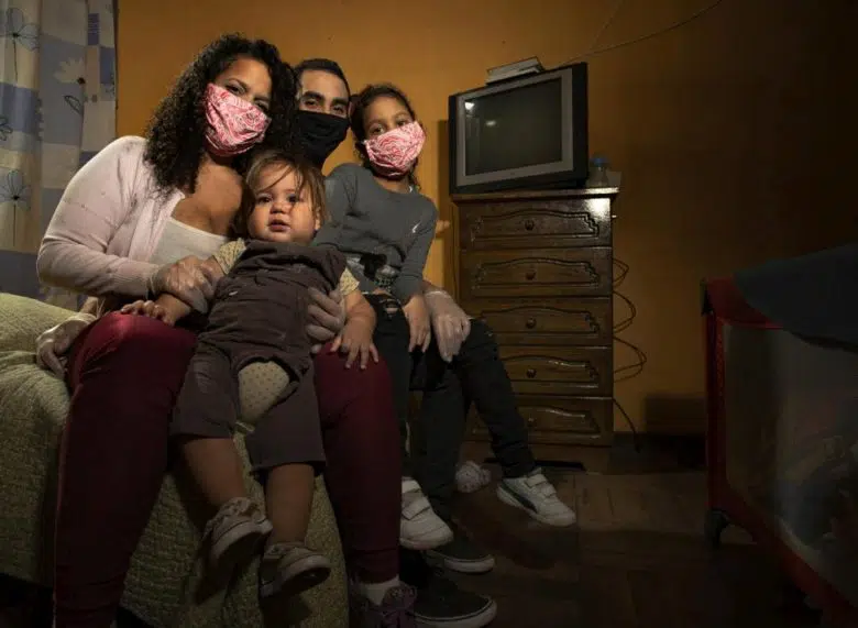 mother and children looking at camera