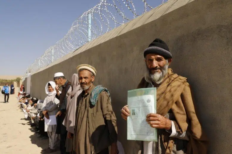 man holding document 