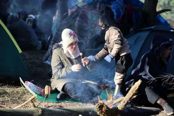 Refugee in makeshift campsite