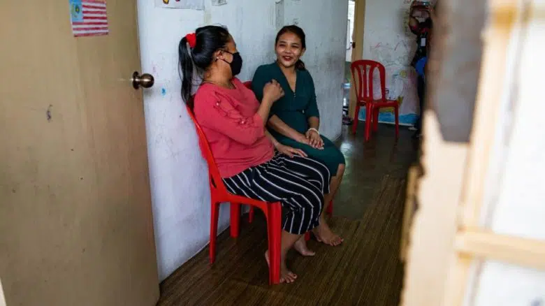 two women sitting 