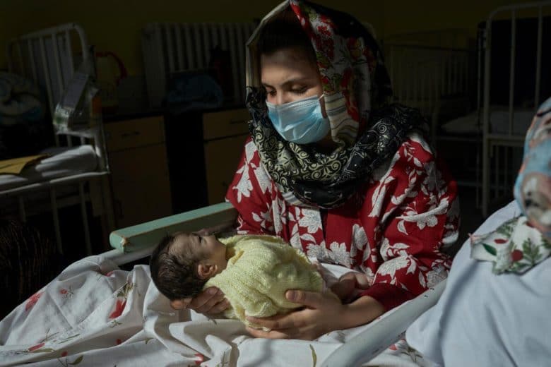 At Kabul’s Ataturk Children’s Hospital, Najiba, 22, holds her son Roshan