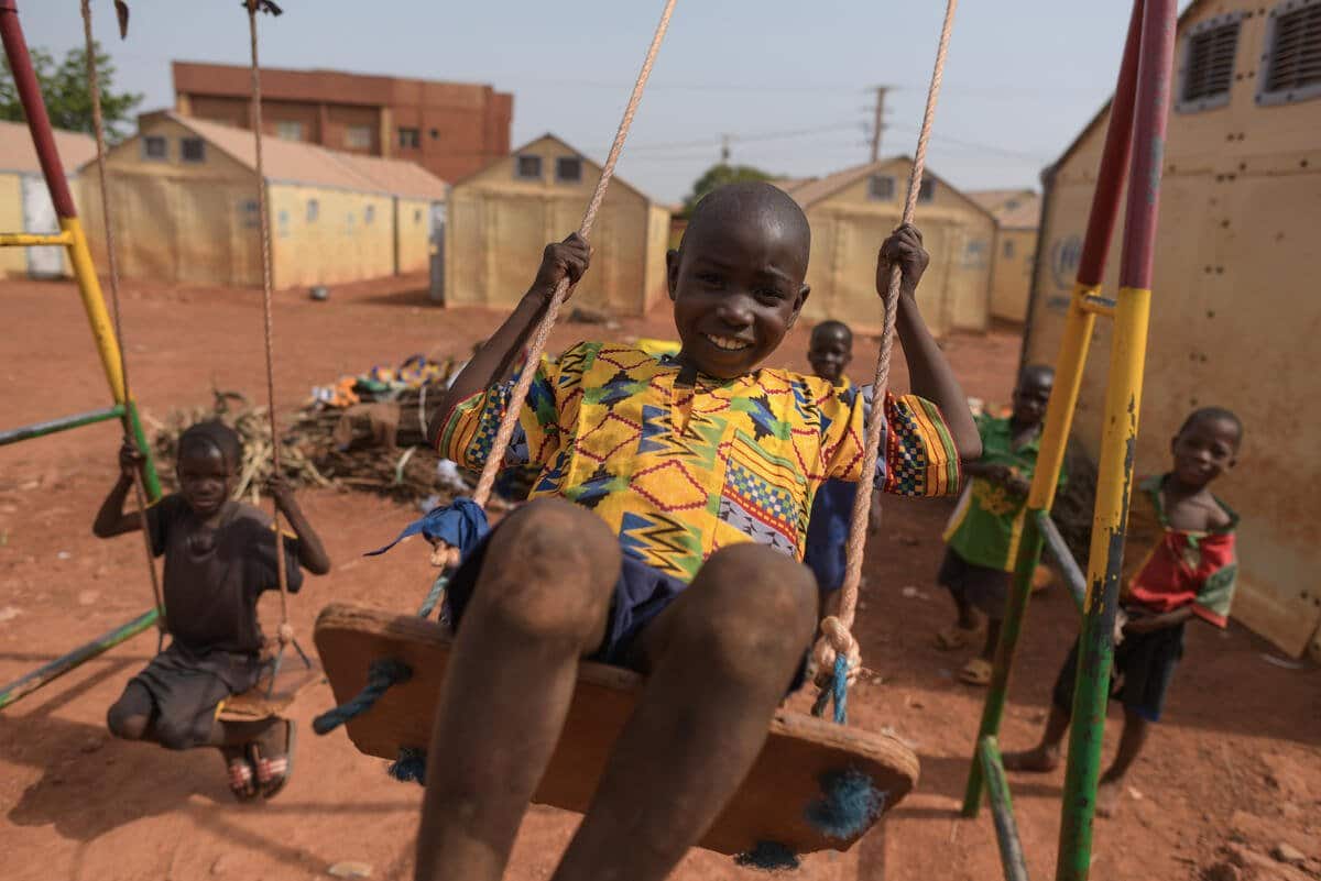 Children play at a family centre for internally displaced people in Ouahigouya, Burkina Faso