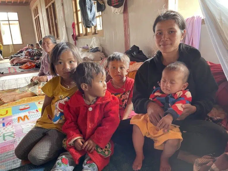 Anna Ruth* with her children outside the monastery in Shan State