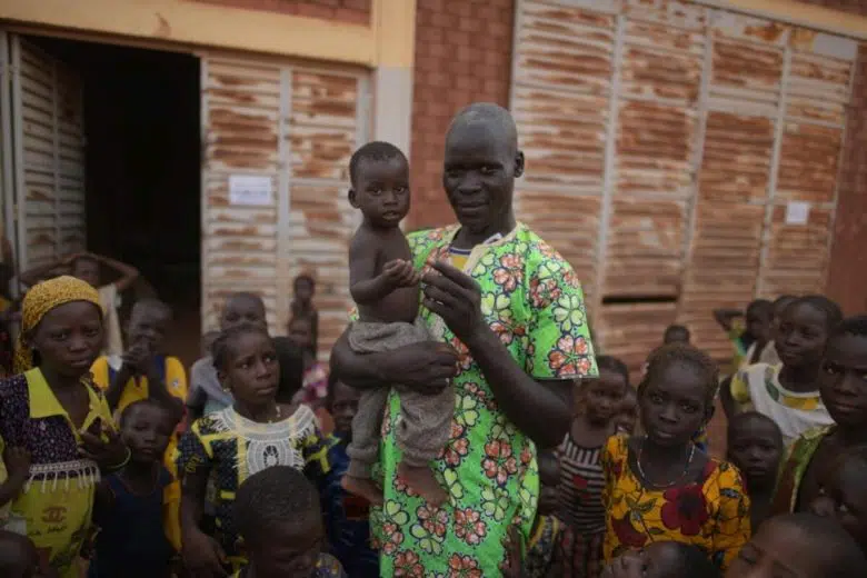 man and son standing 