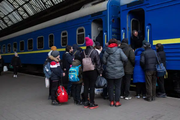 Group of people boarding a train