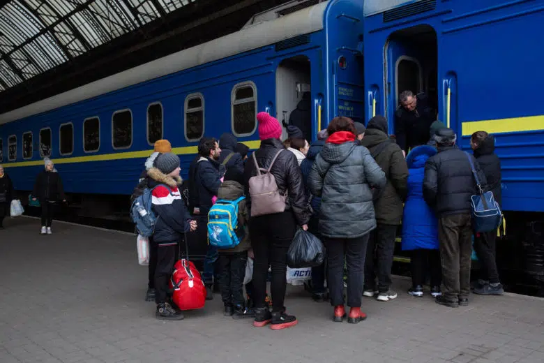 Group of people boarding a train