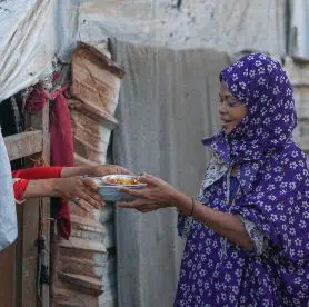 Woman receiving food
