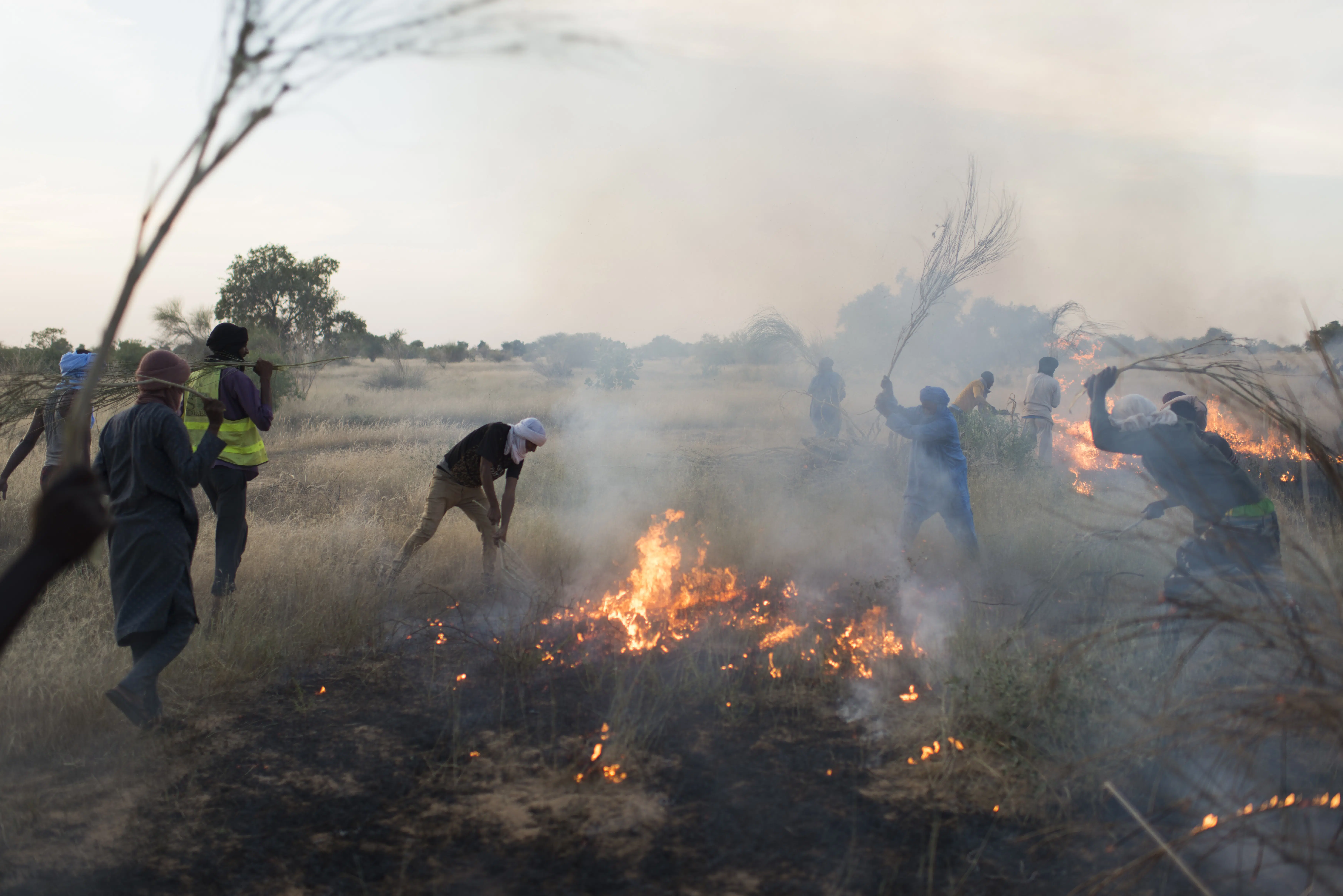 Volunteer firefighters fighting a fire