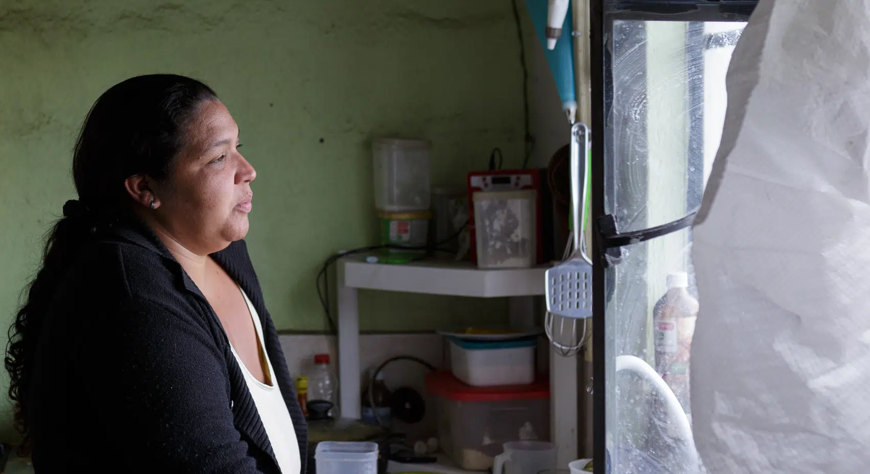 Woman looking out of window