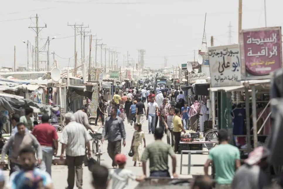 overhead view of a busy street full of people 