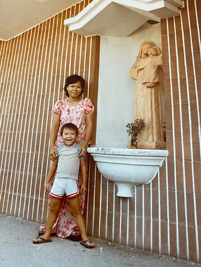Andy Pham is seen in separate photos with his parents at Pulau Bidong refugee camp in 1980.