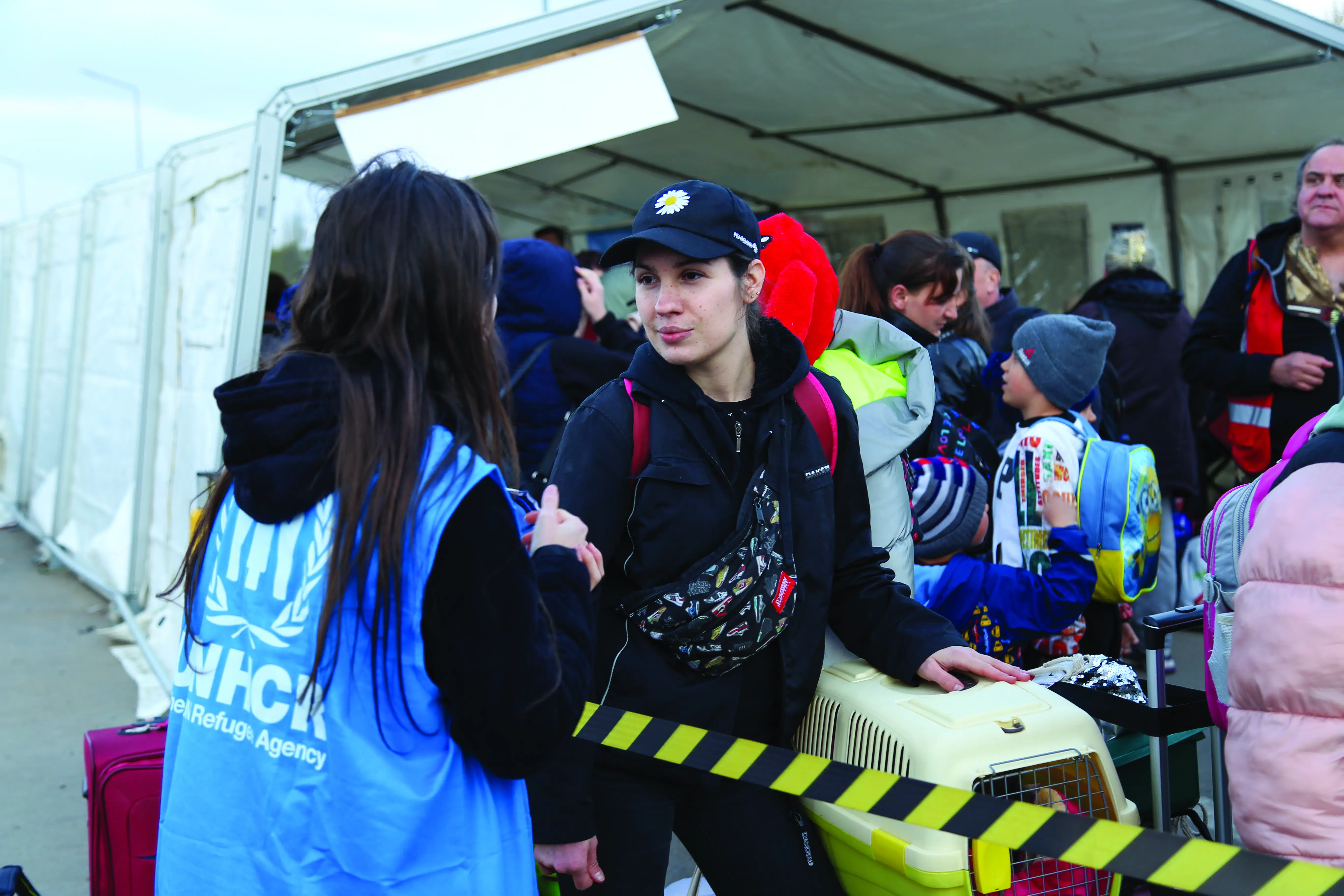 Tanya and her two children arrive in Moldova with their cat. They were among more than 200 refugees from Mykolaiv in southern Ukraine who arrived by bus at the Palanca crossing of the Moldova border with Ukraine.